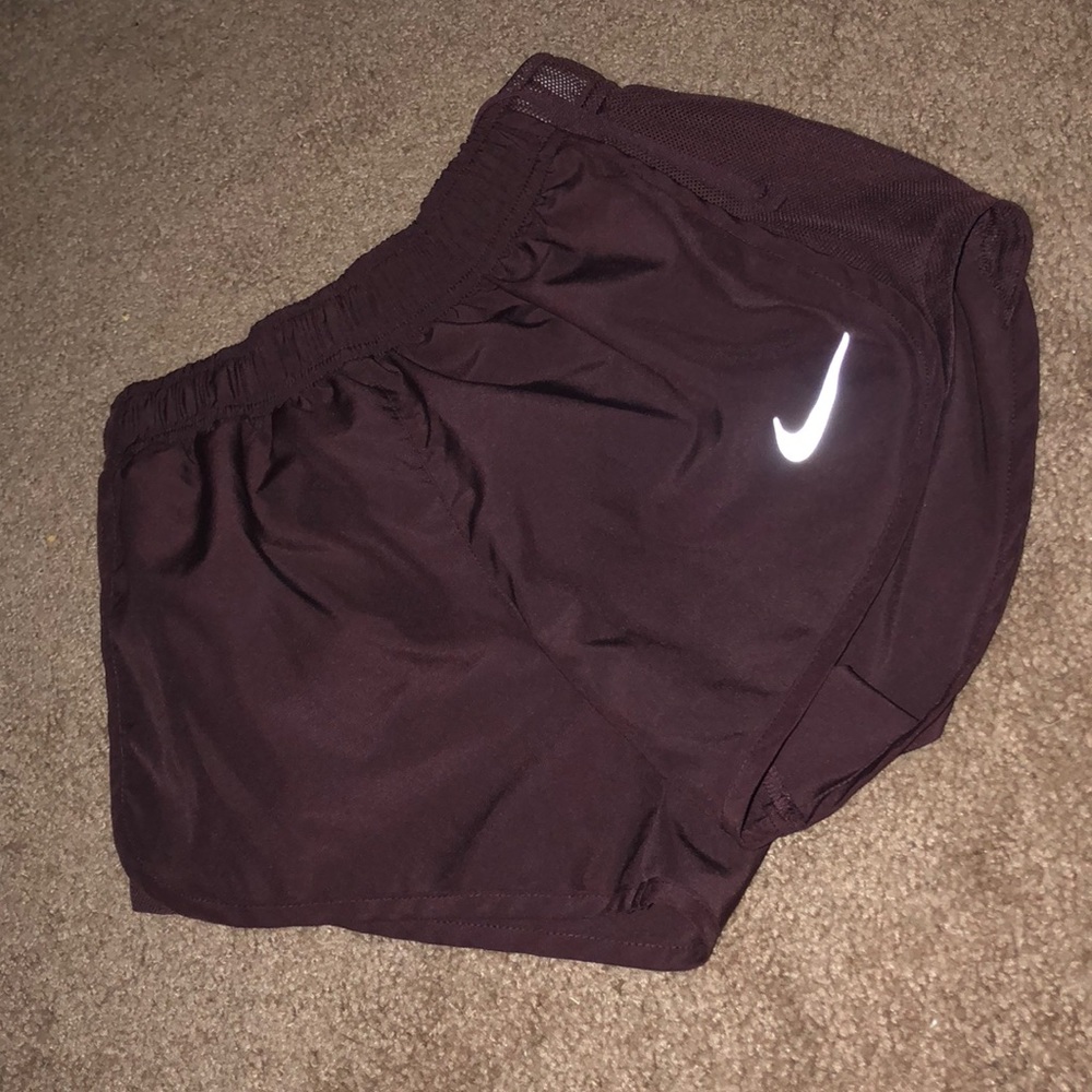 Burgundy nike running shorts